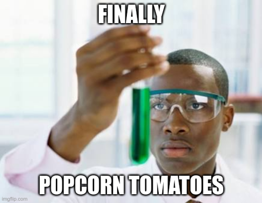 Scientist looking at test tube: Finally - Popcorn tomatoes