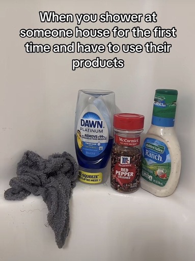 Picture of dawn dish soap, red pepper, and a bottle of ranch dressing in a shower with the caption “When you shower at someone house for the first time and have to use their products”
